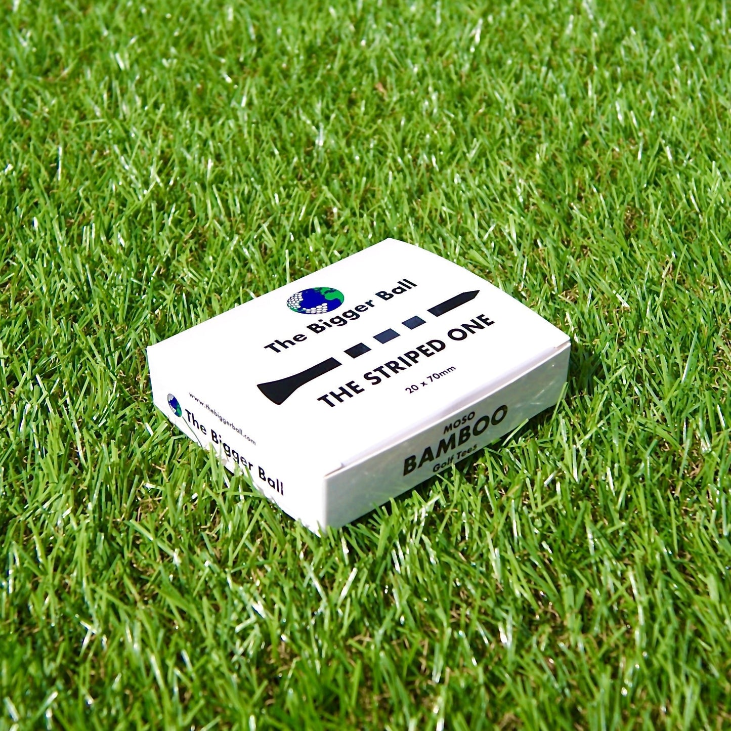 box of striped golf tees