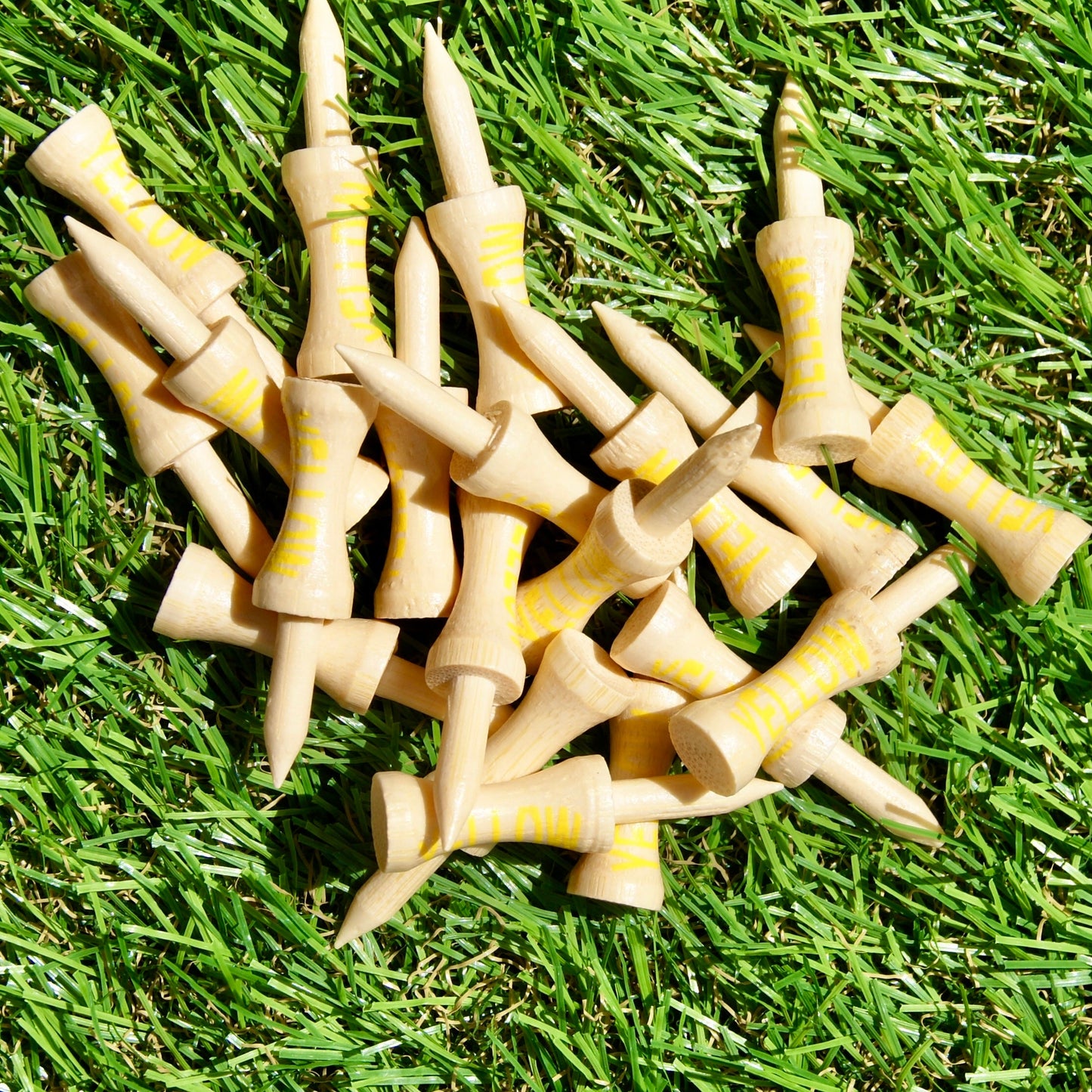 Yellow golf tees