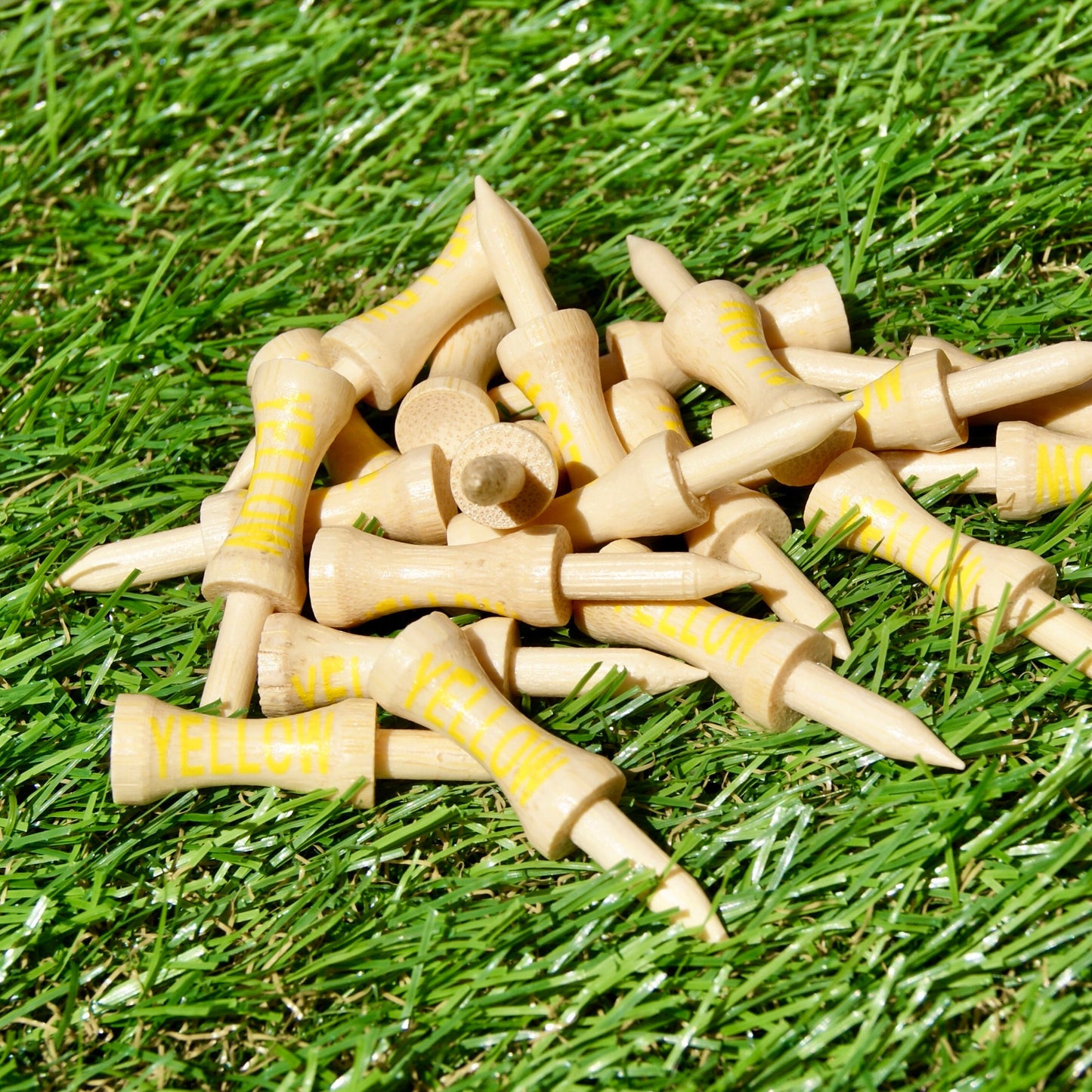 Yellow golf tees