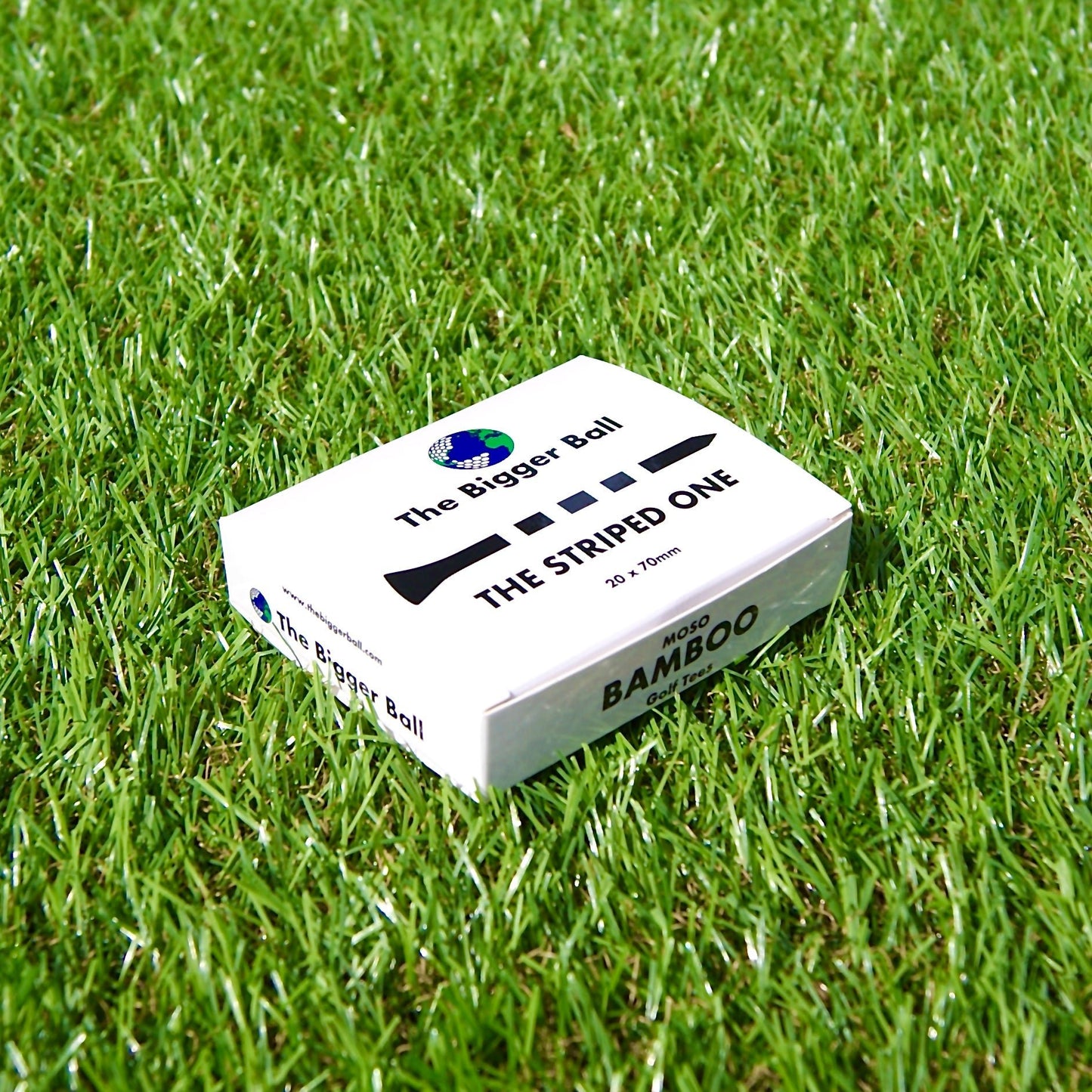 box of striped golf tees