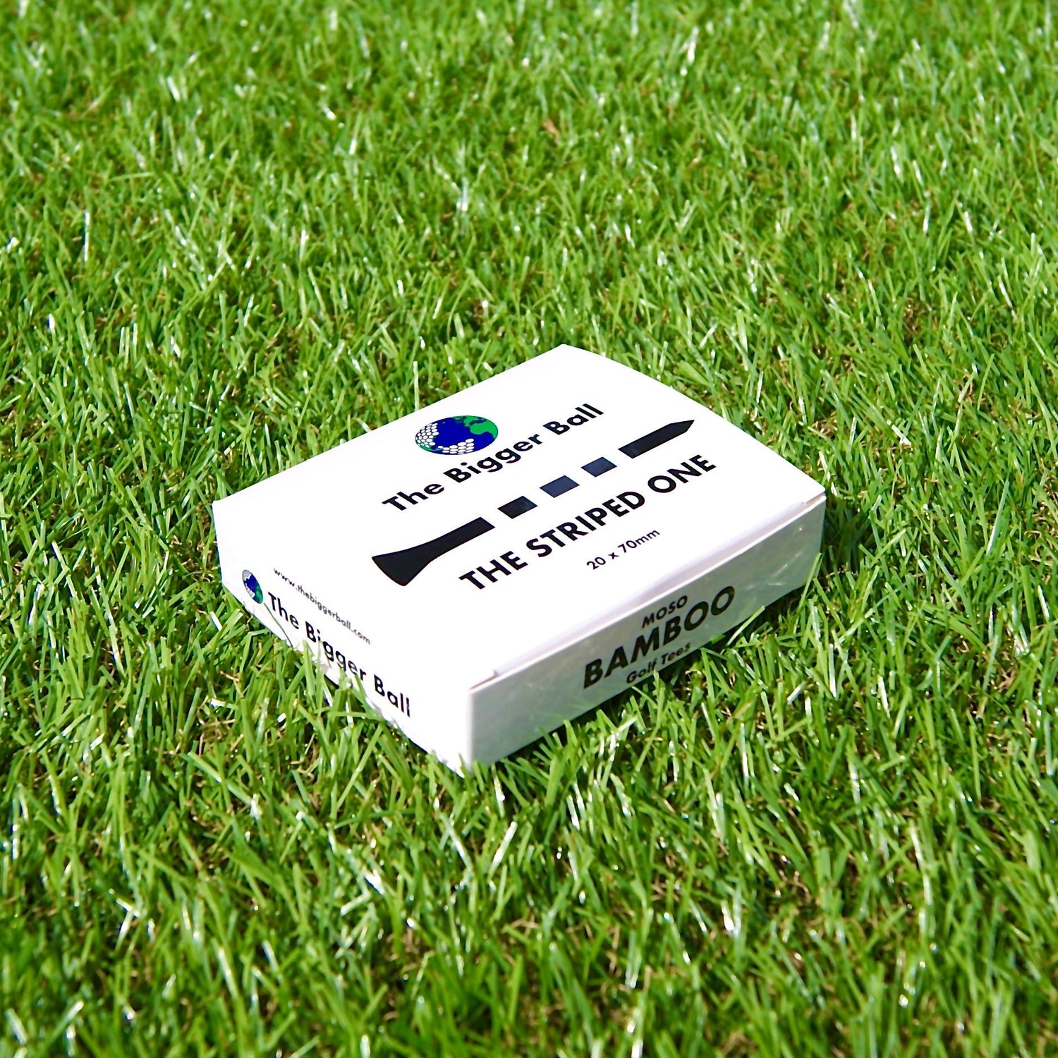 box of striped golf tees