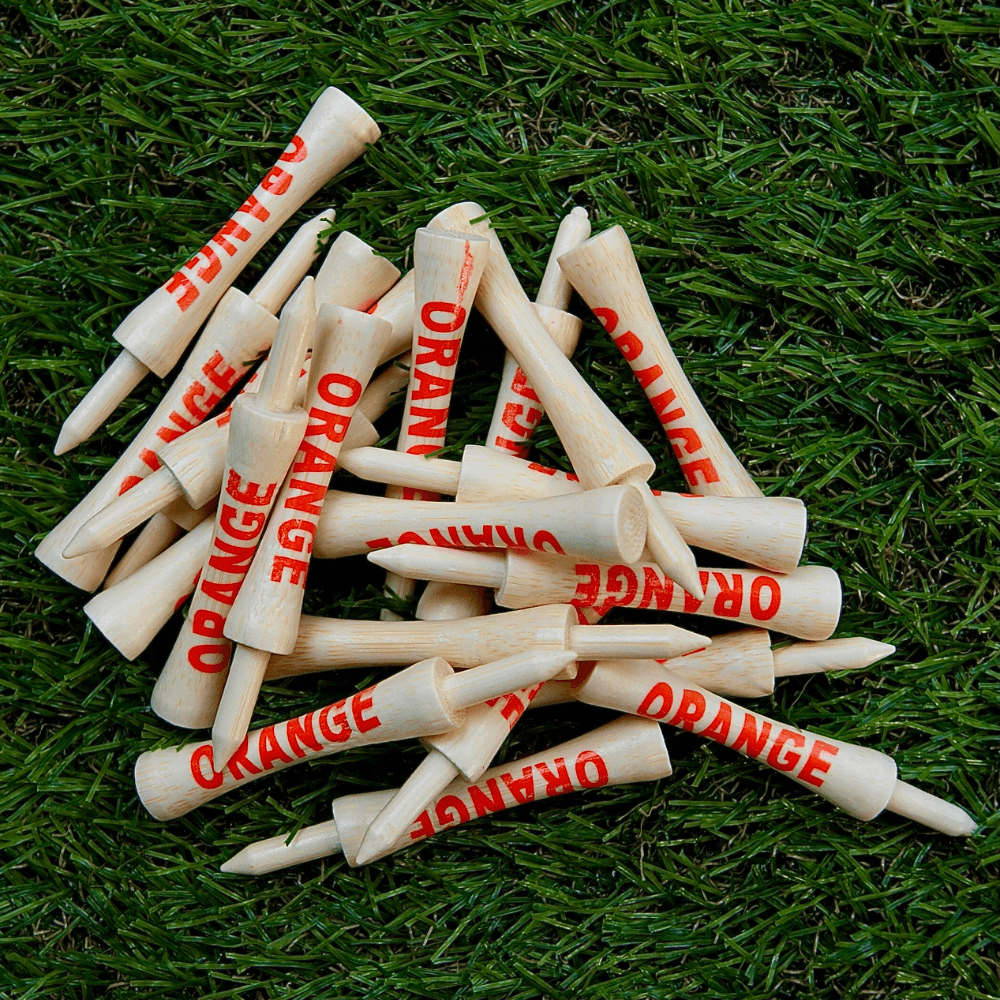 pile of loose orange bamboo tees