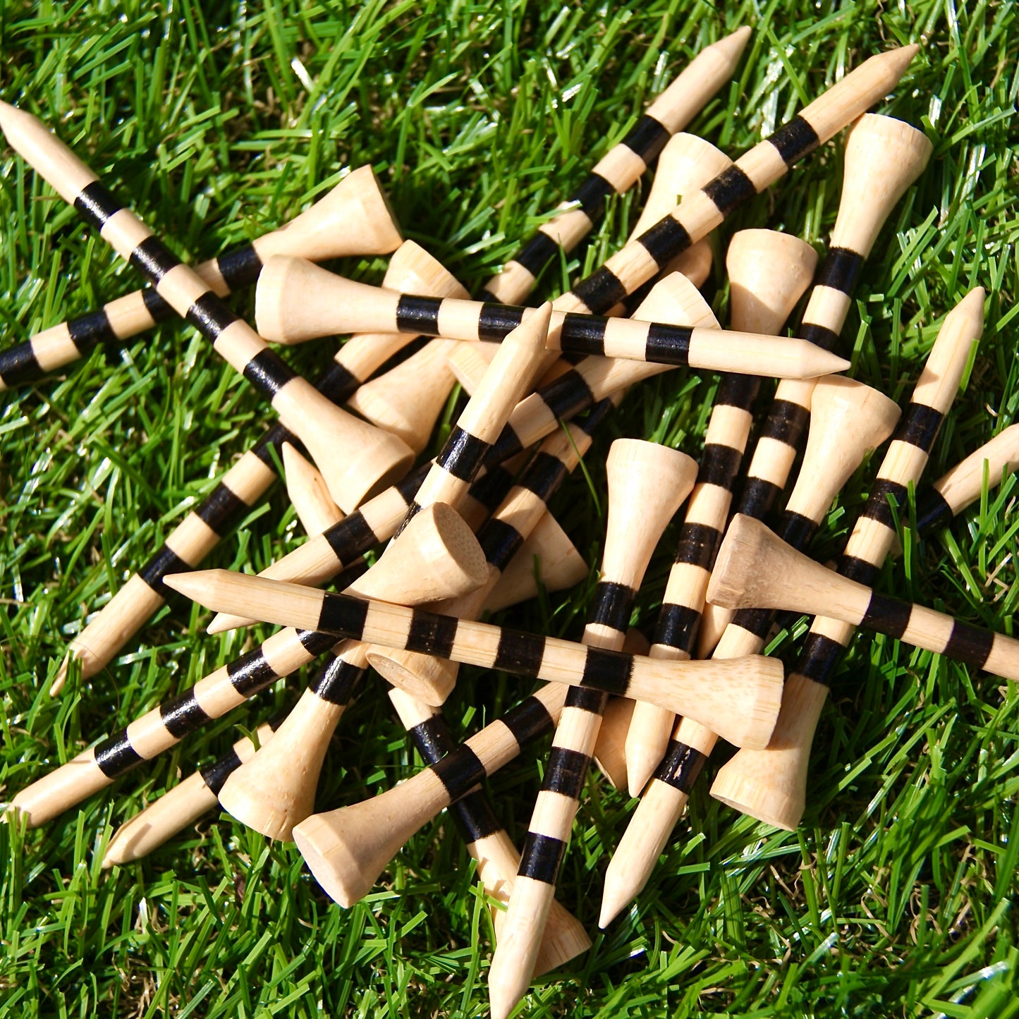 THE STRIPED ONE (70mm) Bamboo Golf Tees on astro turf